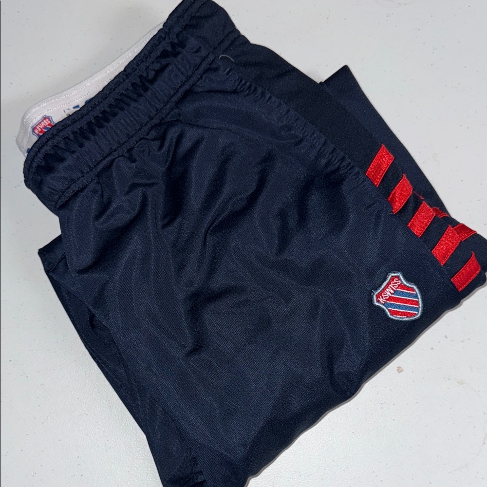 Navy athletic track pants with snaps
31in inseam